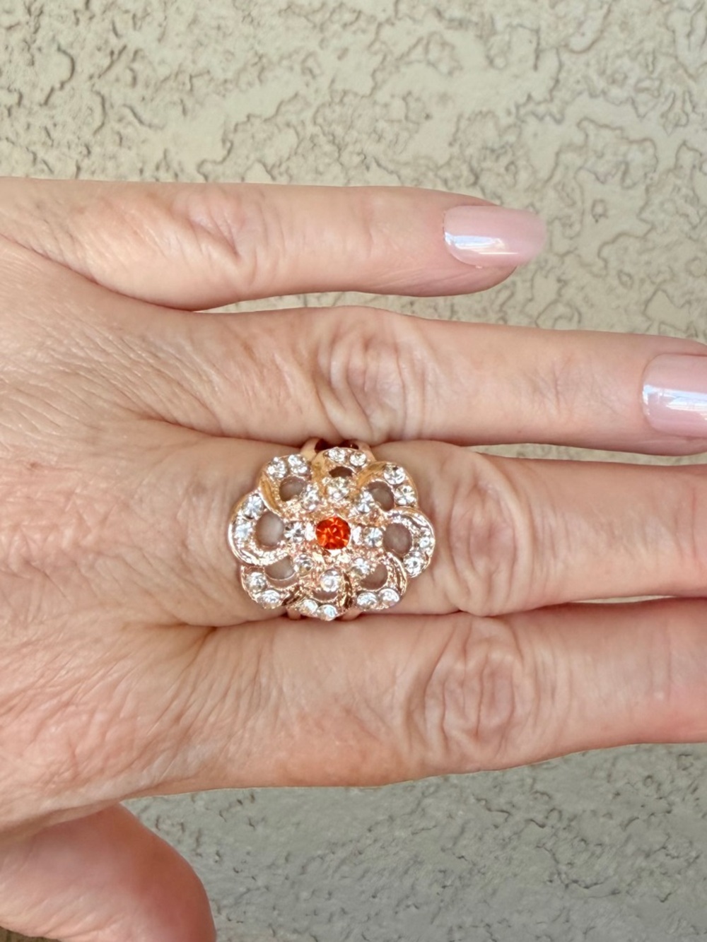 Intricate Rose Gold Floral Statement Ring with Orange Center Stone